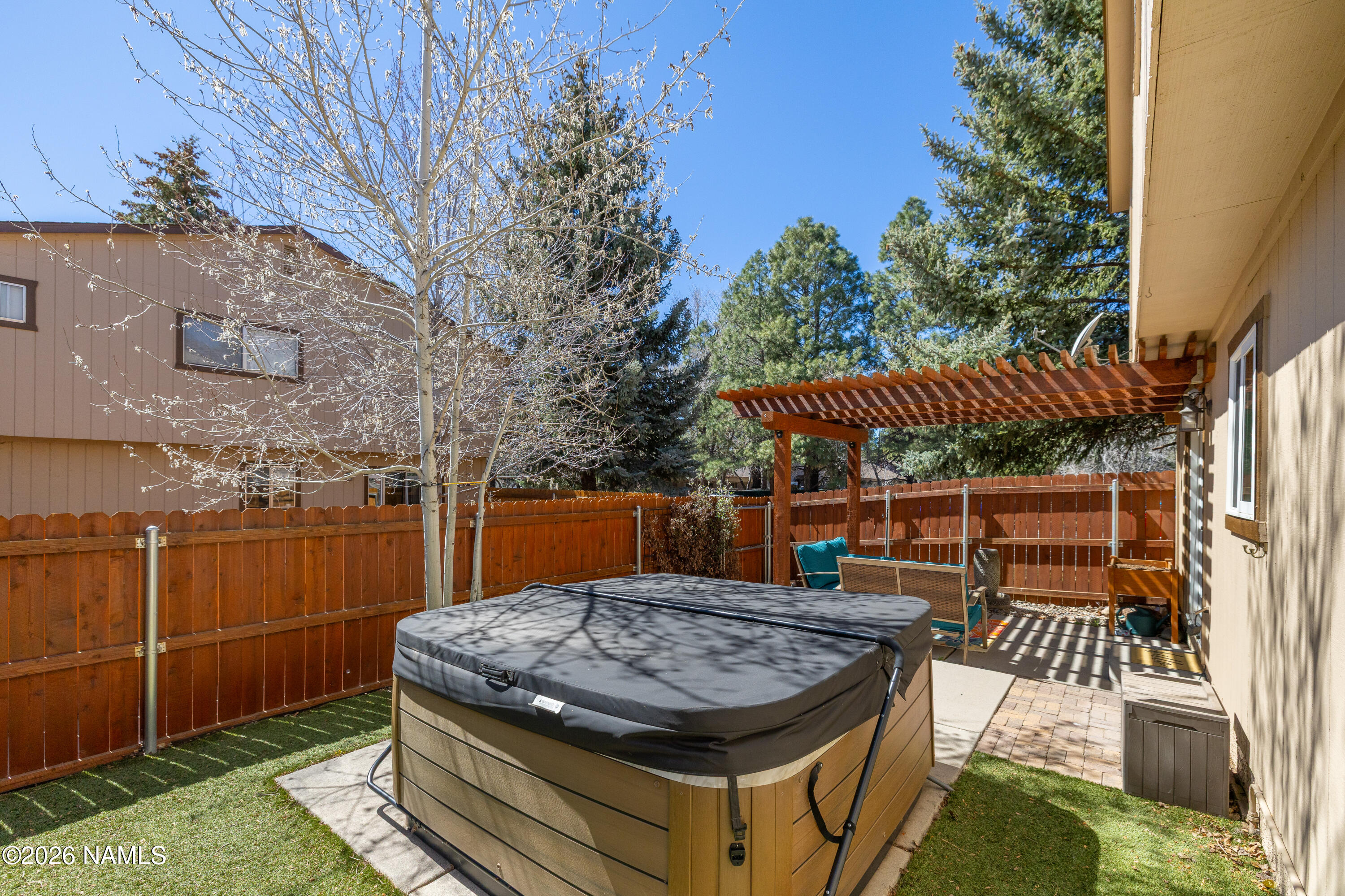 2536 East Eva Loop Flagstaff, AZ 86004 - Photo 34 of 37 a view of a backyard with sitting area