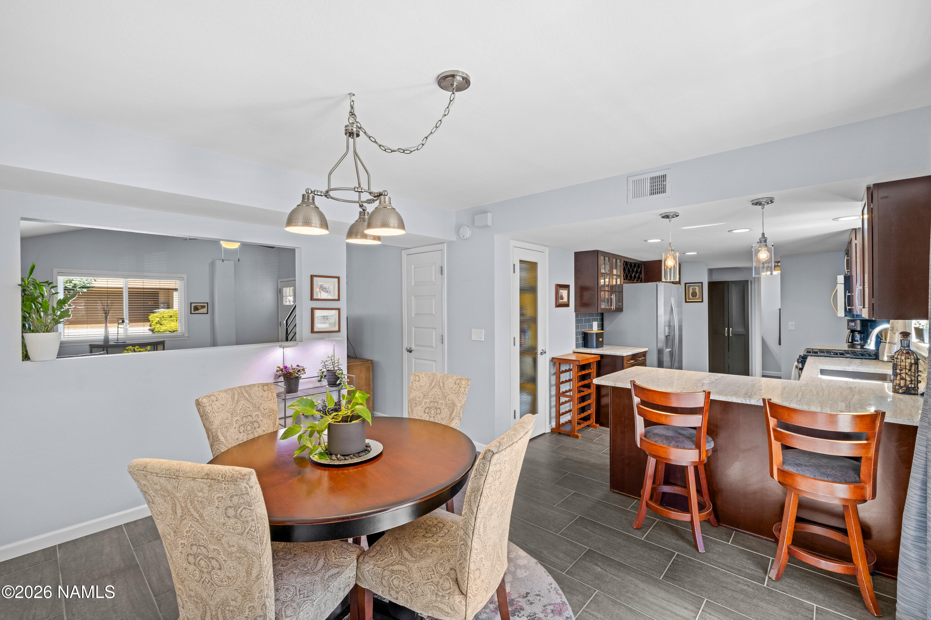 2536 East Eva Loop Flagstaff, AZ 86004 - Photo 9 of 37 a view of a dining room with furniture