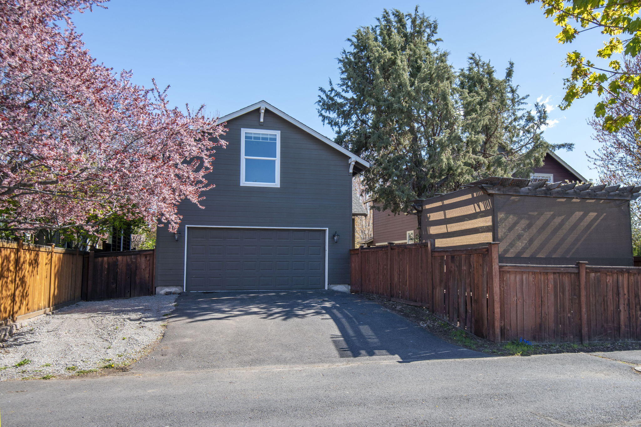 62744 Larkview Road Bend, OR 97701 - Photo 21 of 25 a view of a house with a backyard