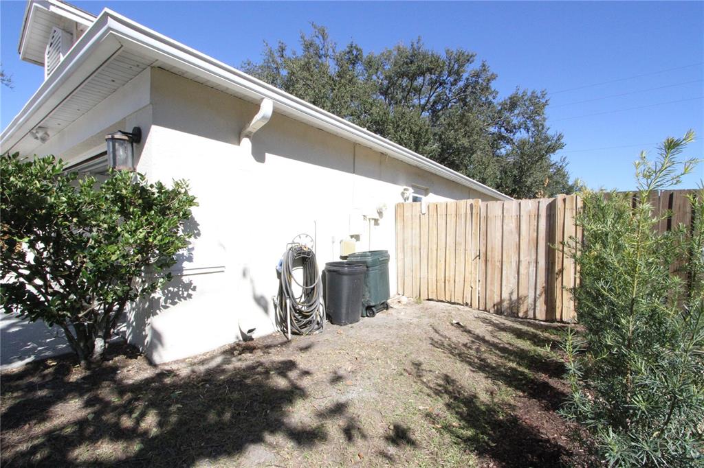 1414 Norwick Drive Lutz, FL 33559 - Photo 39 of 43 a view of a backyard with patio