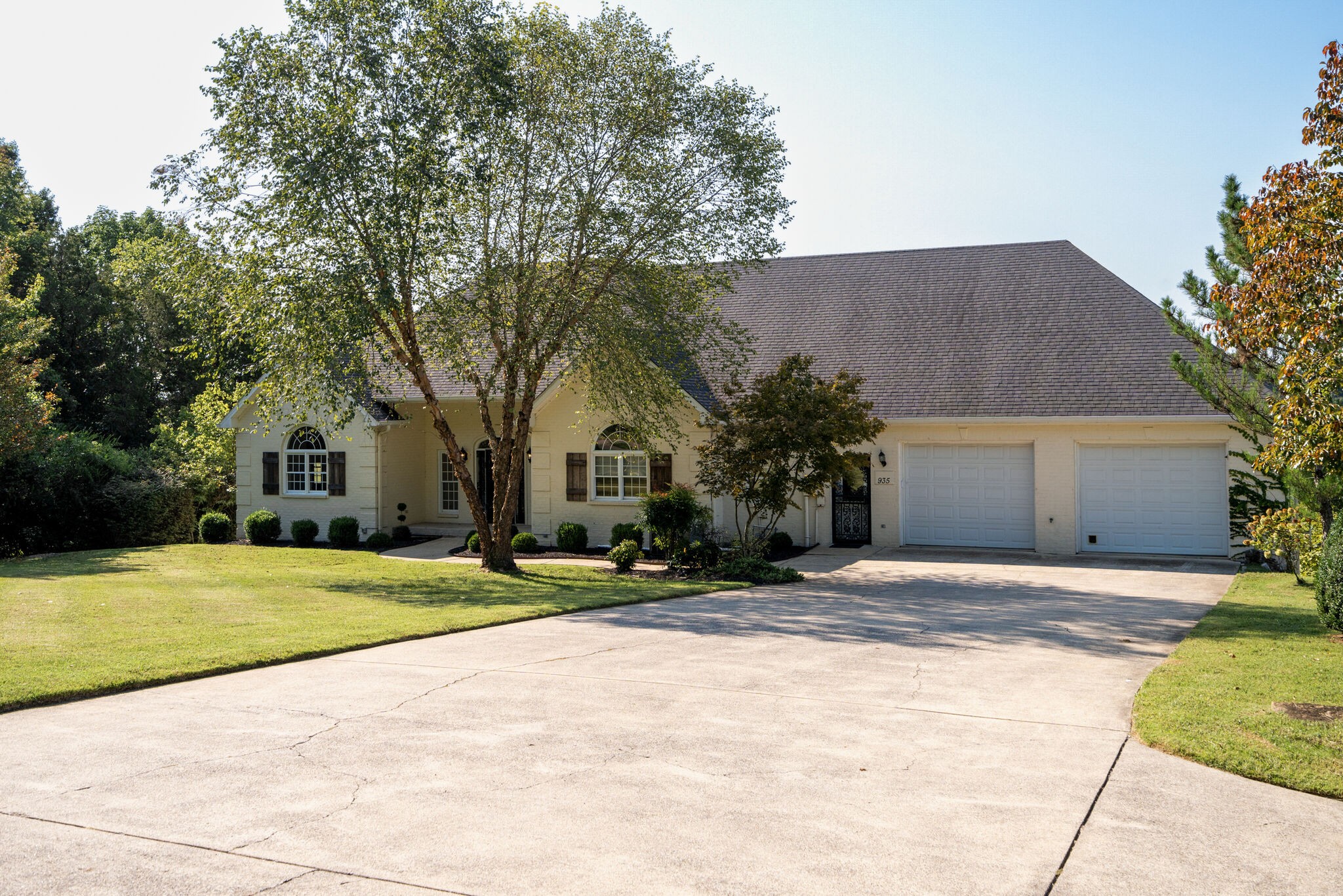 935 Barnes Road Antioch, TN 37013 - Photo 2 of 47 a front view of a house with a yard and garage