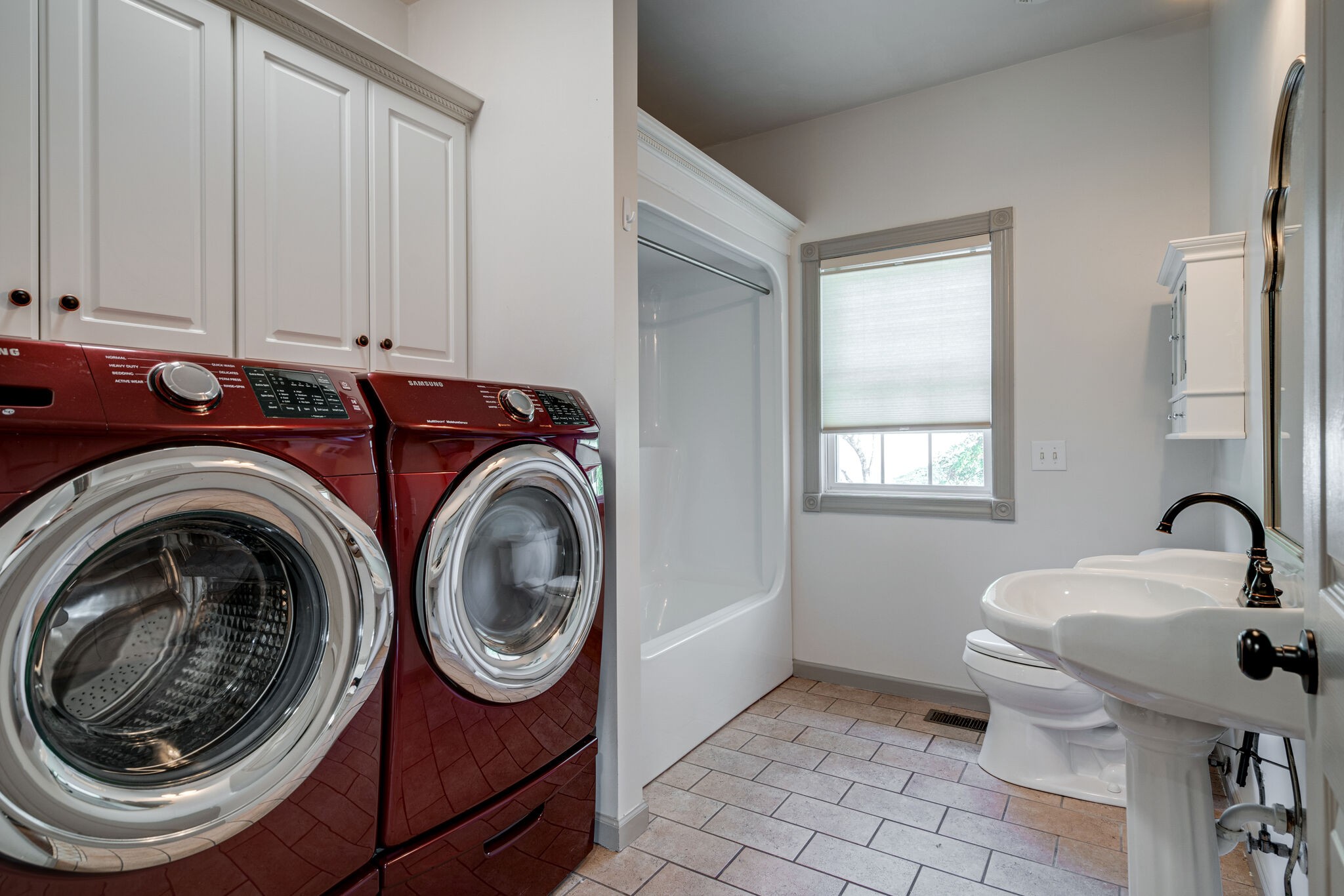 935 Barnes Road Antioch, TN 37013 - Photo 24 of 47 a utility room with sink dryer and washer