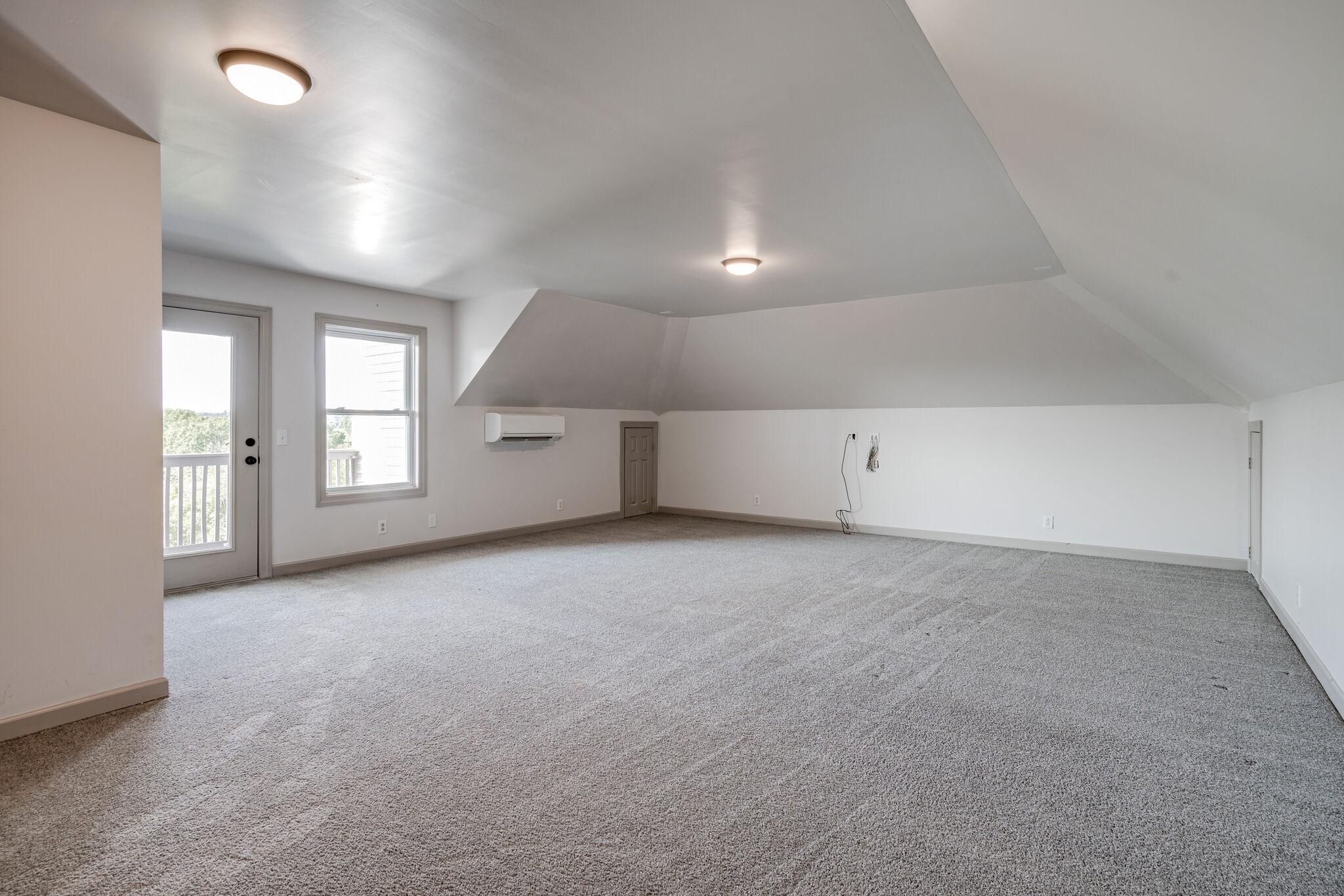 935 Barnes Road Antioch, TN 37013 - Photo 26 of 47 an empty room with windows and pillars in it