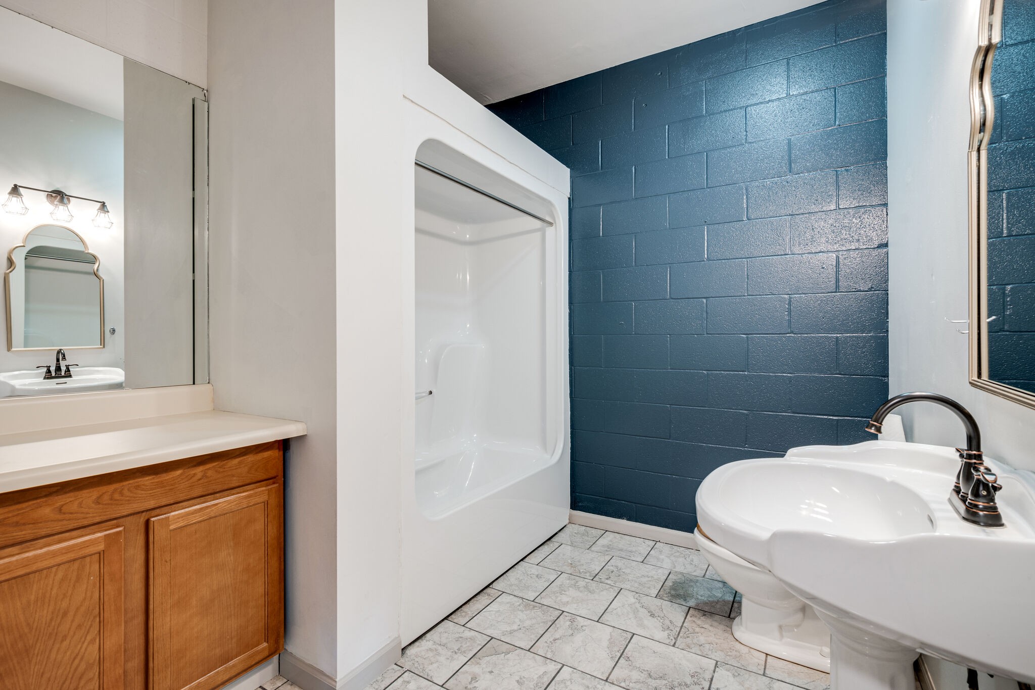 935 Barnes Road Antioch, TN 37013 - Photo 34 of 47 a bathroom with a sink a toilet and mirror