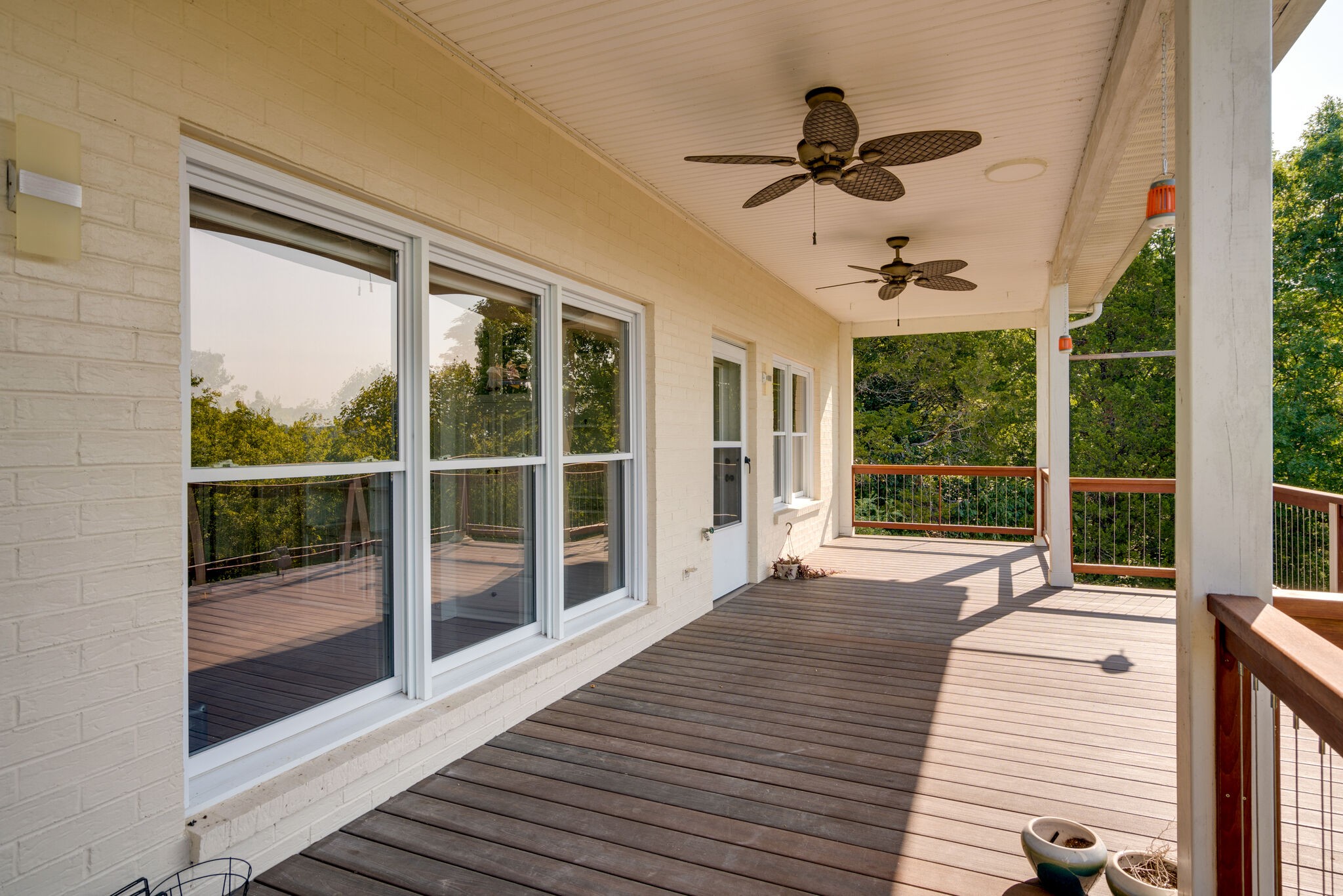 935 Barnes Road Antioch, TN 37013 - Photo 38 of 47 a view of a living room and a floor to ceiling window with wooden floor