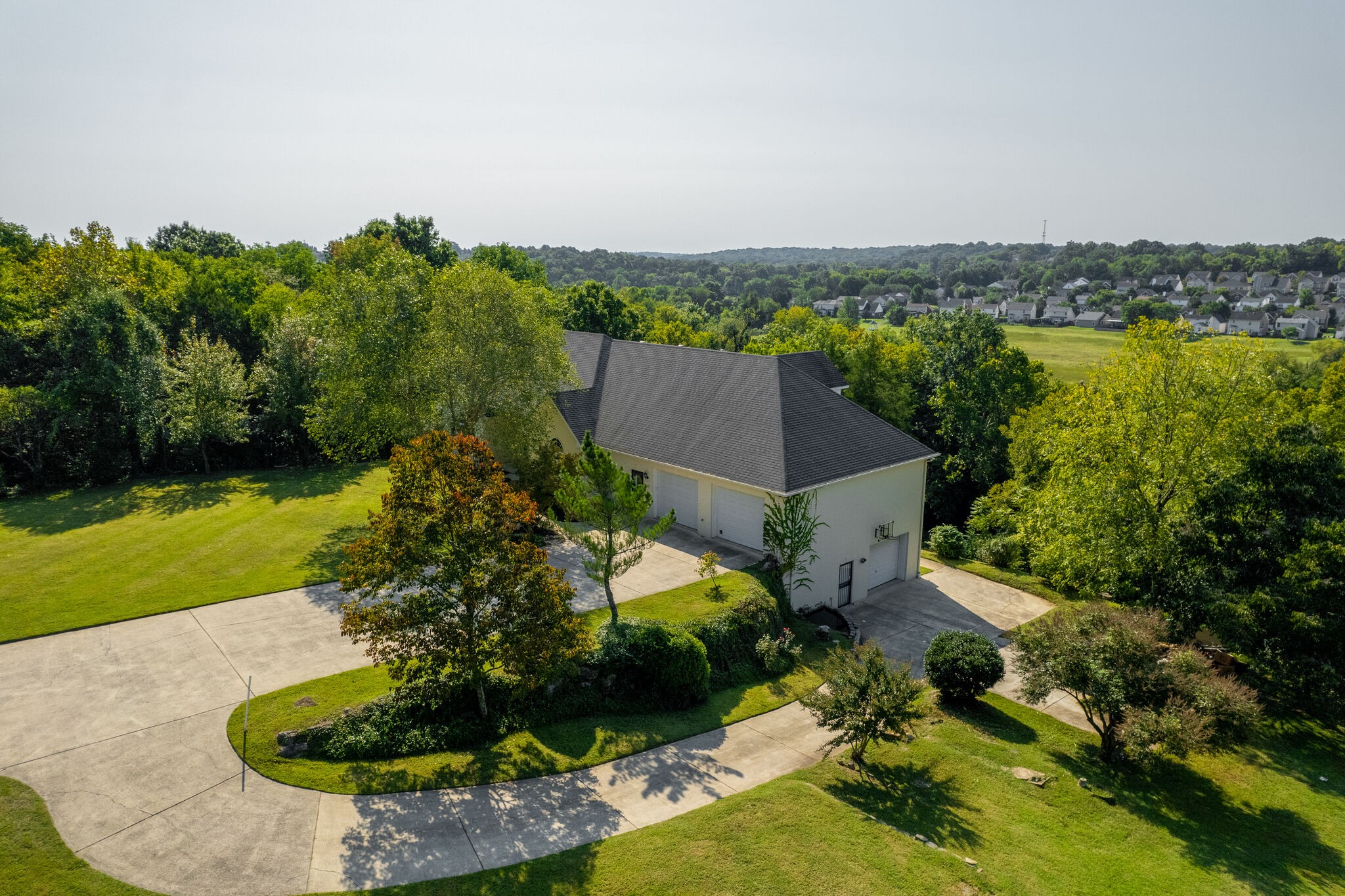 935 Barnes Road Antioch, TN 37013 - Photo 41 of 47 an aerial view of a house with a garden and lake view