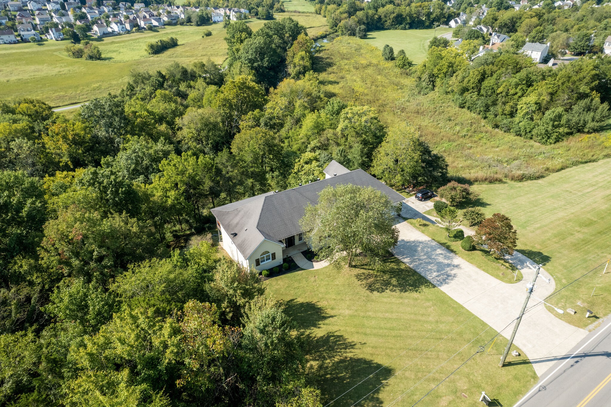 935 Barnes Road Antioch, TN 37013 - Photo 43 of 47 a view of a lake with a yard