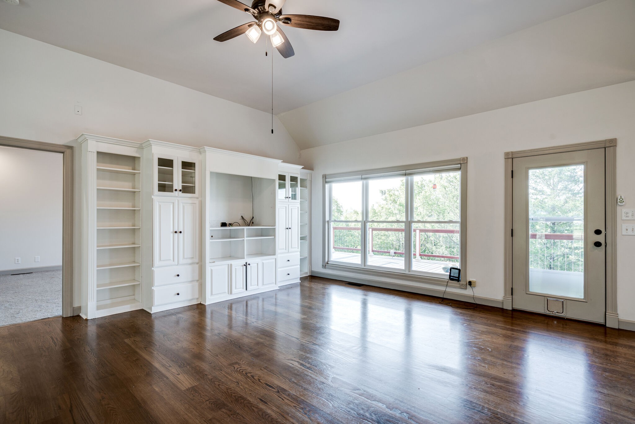 935 Barnes Road Antioch, TN 37013 - Photo 7 of 47 a view of an empty room with a window and wooden floor