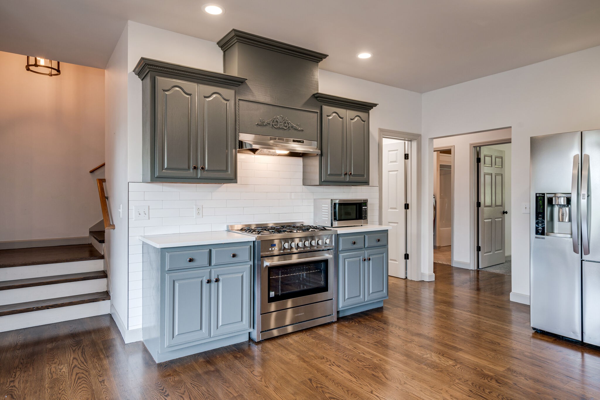 935 Barnes Road Antioch, TN 37013 - Photo 9 of 47 a kitchen with stainless steel appliances a stove and a refrigerator