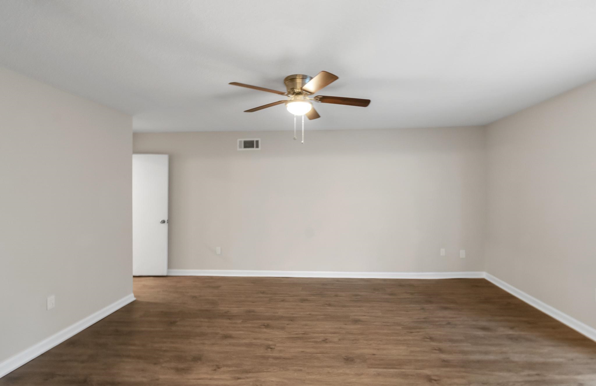 3036 Canyon Road Memphis, TN 38134 - Photo 18 of 24 a view of room with hardwood floor and ceiling fan