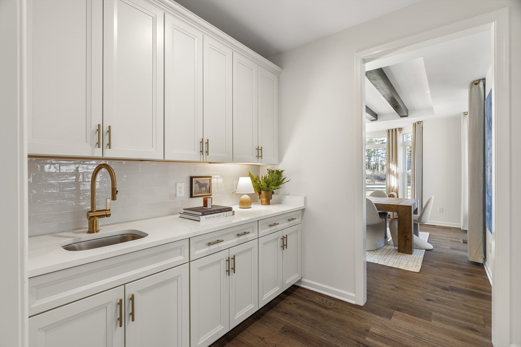 29 Germain Way, Unit 3 Norton, MA 02766 - Photo 12 of 40 a kitchen with sink and cabinets