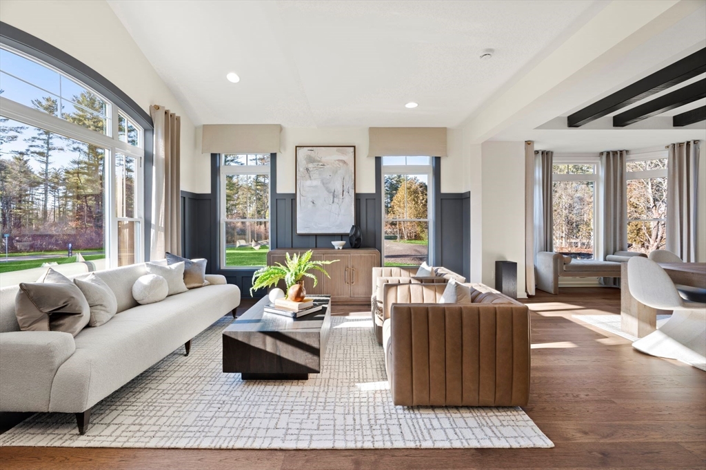 29 Germain Way, Unit 3 Norton, MA 02766 - Photo 16 of 40 a living room with furniture and large windows
