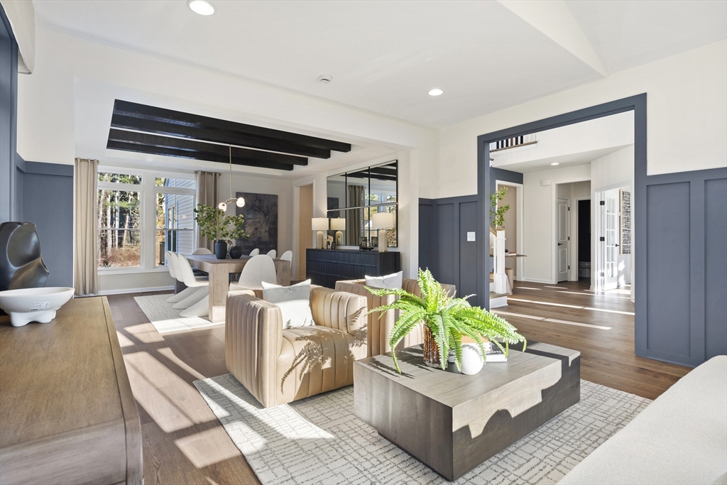 29 Germain Way, Unit 3 Norton, MA 02766 - Photo 17 of 40 a living room with furniture and a wooden floor