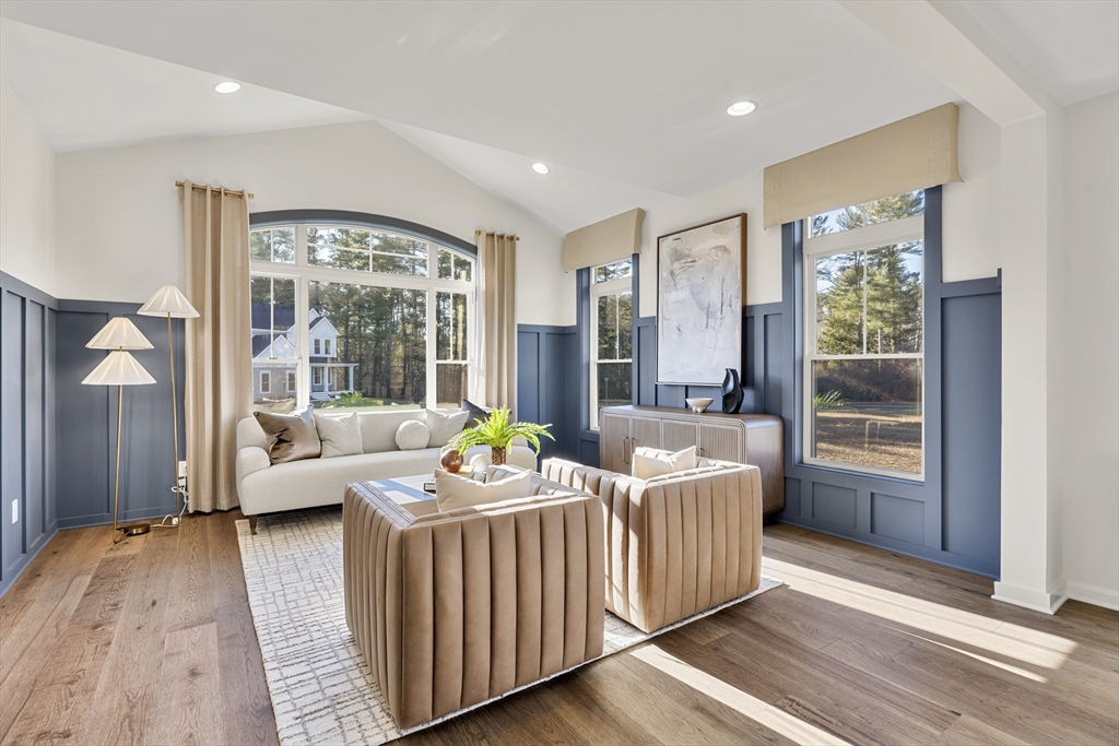 29 Germain Way, Unit 3 Norton, MA 02766 - Photo 18 of 40 a living room with furniture and a large window