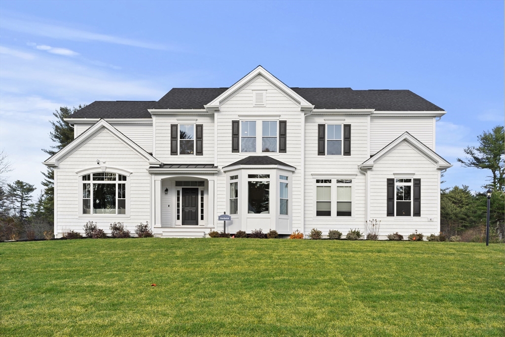 29 Germain Way, Unit 3 Norton, MA 02766 - Photo 2 of 40 front view of a house with a yard