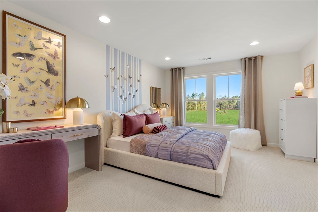 29 Germain Way, Unit 3 Norton, MA 02766 - Photo 28 of 40 a spacious bedroom with a large bed and a window