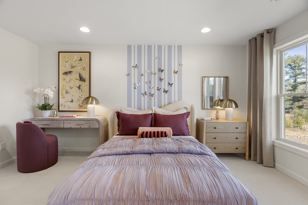 29 Germain Way, Unit 3 Norton, MA 02766 - Photo 29 of 40 a bedroom with a bed and a couch