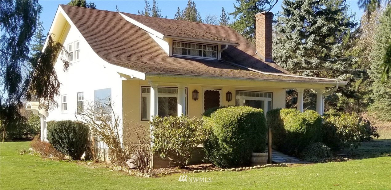 5413 Waschke Road Bellingham, WA 98226 - Photo 1 of 33 a view of a house with backyard and trees