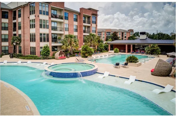 a view of a big yard with a fountain