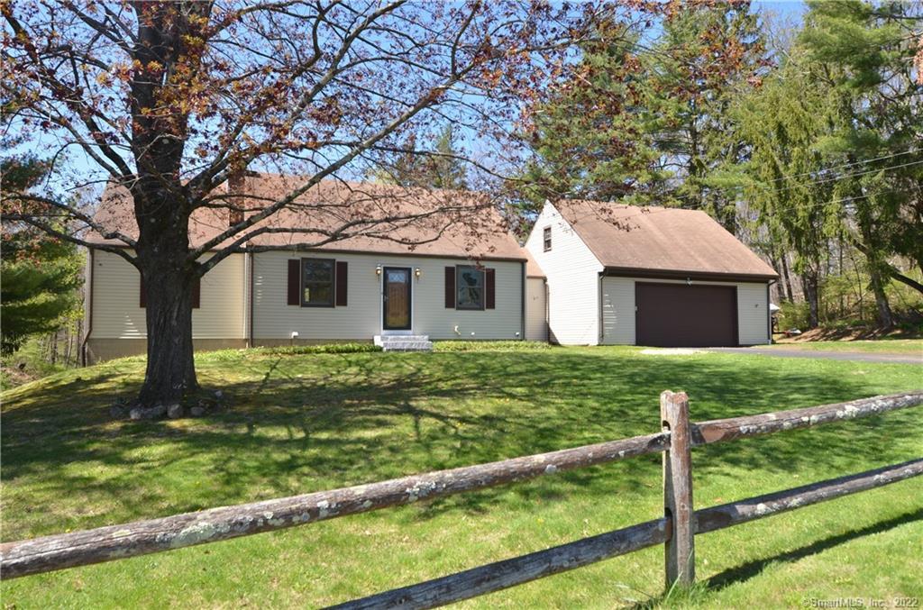 6 Taunton Lake Road Newtown, CT 06470 - Photo 1 of 1 a view of a house with yard and a large tree