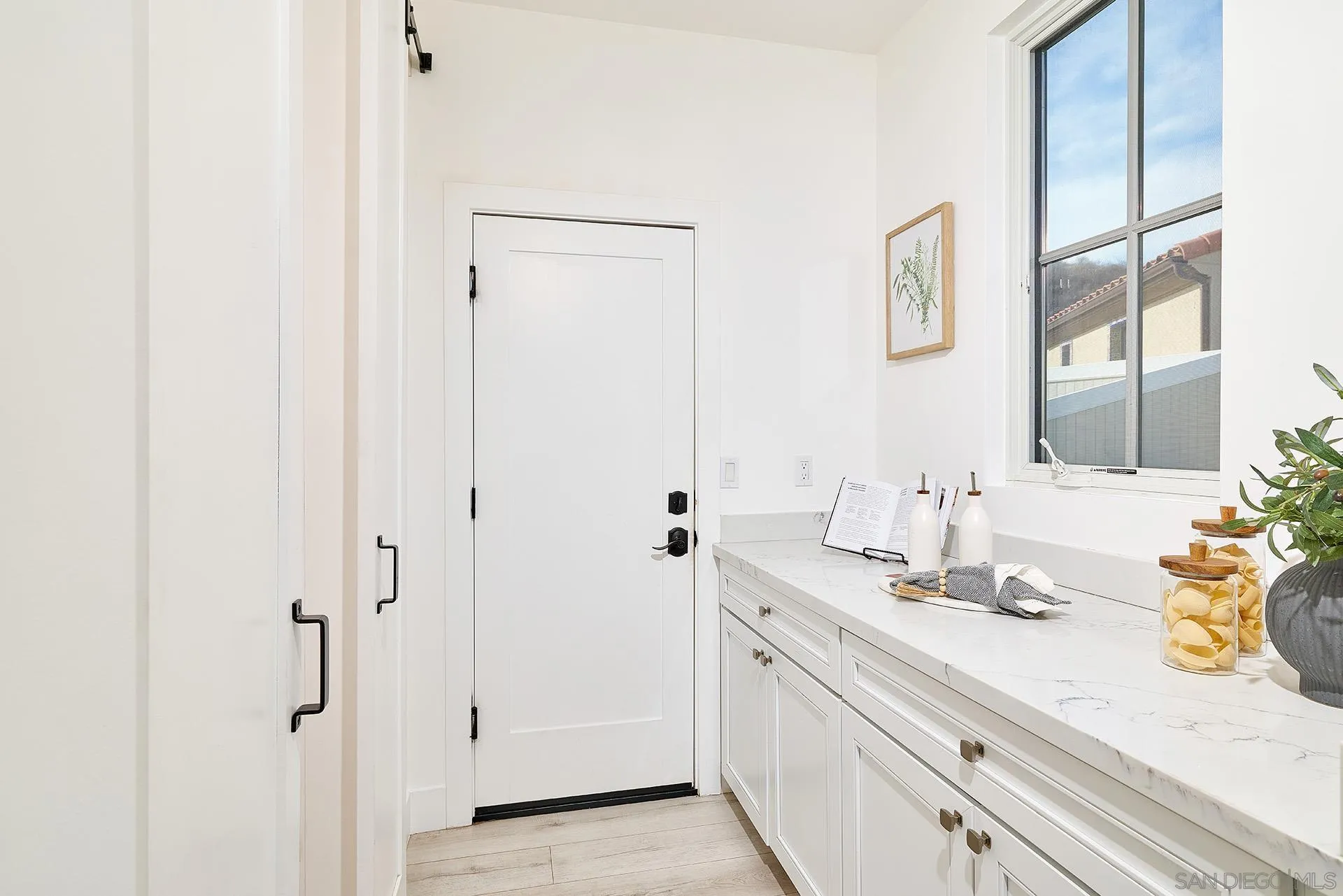 12410 Aria Court Poway, CA 92064 - Photo 11 of 47 a bathroom with a sink and a mirror