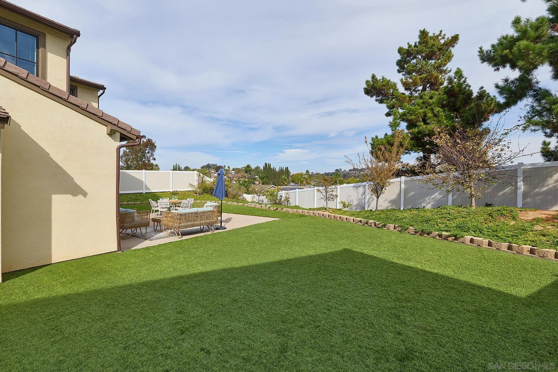 12410 Aria Court Poway, CA 92064 - Photo 36 of 47 a view of a garden with a building in the background