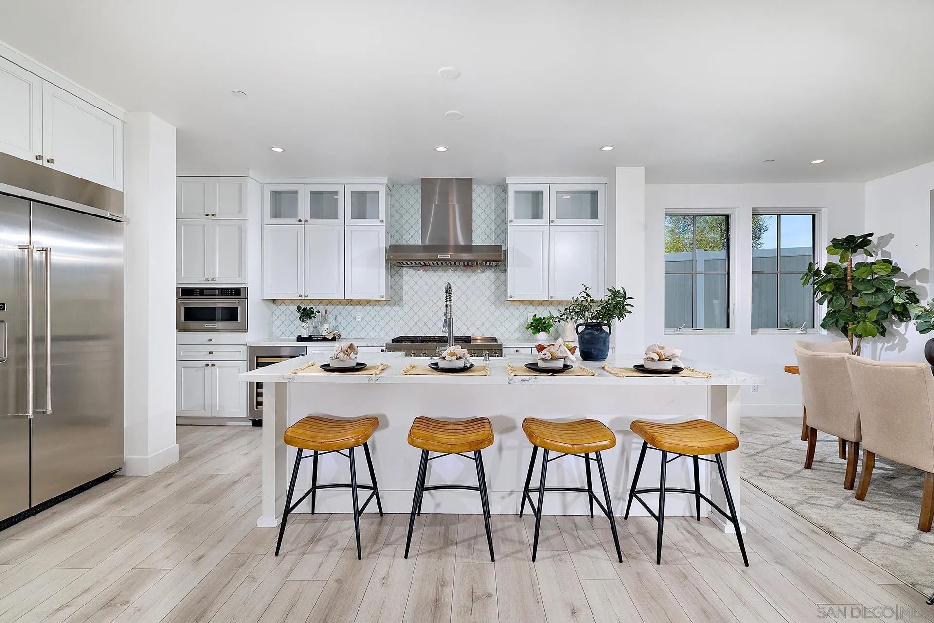 12410 Aria Court Poway, CA 92064 - Photo 4 of 47 a view of a dining room with furniture and wooden floor