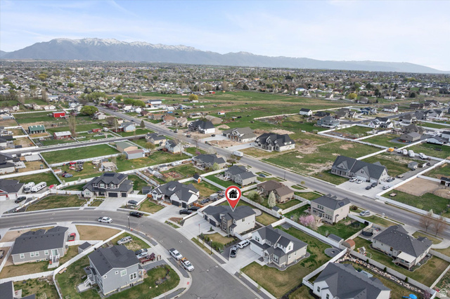 3359 Eurasian Crane Road Clinton, UT 84015 - Photo 58 of 71 Aerial view of residential area featuring mountains