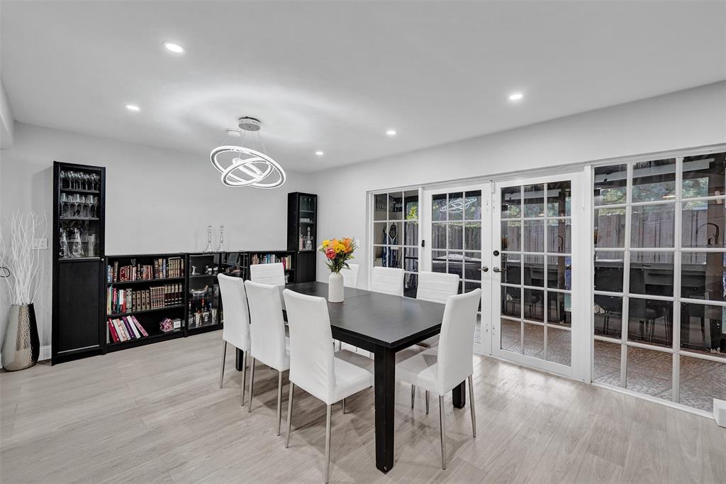 3301 Raleigh Street, Unit 4B Hollywood, FL 33021 - Photo 17 of 54 a view of a dining room with furniture and window