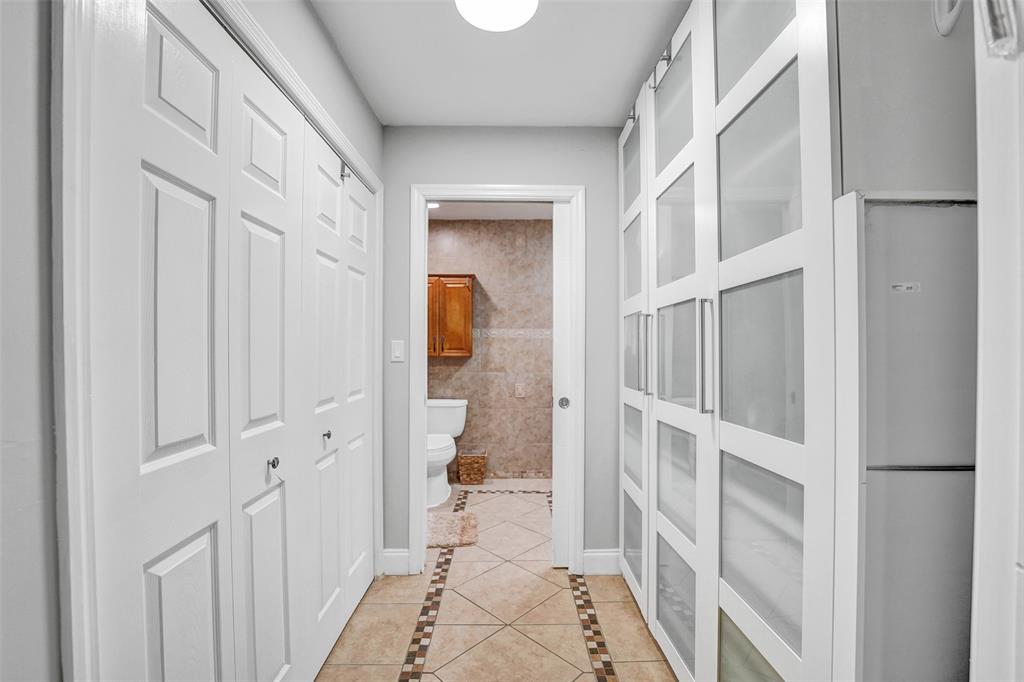3301 Raleigh Street, Unit 4B Hollywood, FL 33021 - Photo 45 of 54 a view of a hallway with a hardwood floor and a hallway