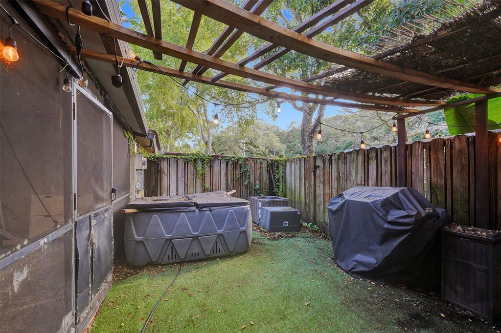 3301 Raleigh Street, Unit 4B Hollywood, FL 33021 - Photo 51 of 54 a view of a backyard with furniture