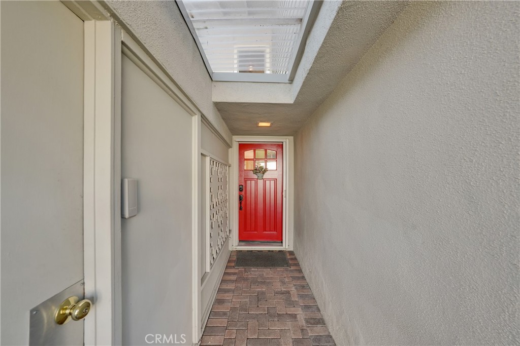 2422 Miseno Way Costa Mesa, CA 92627 - Photo 2 of 40 a view of hallway with wooden floor