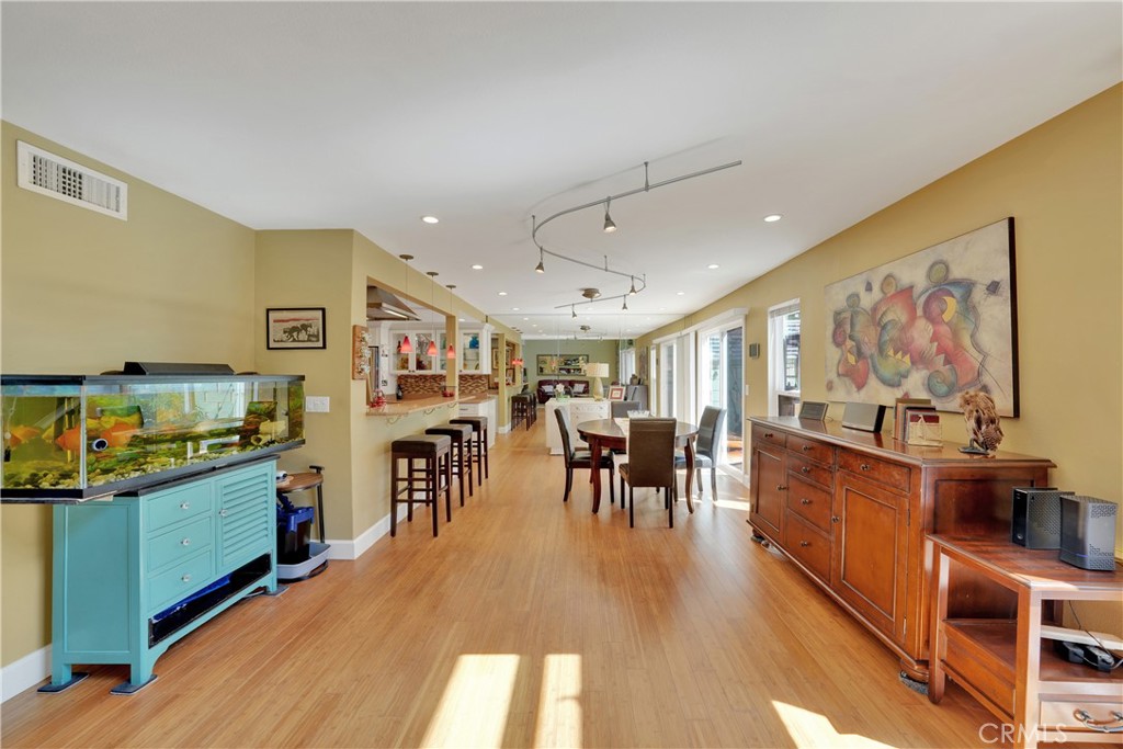 2422 Miseno Way Costa Mesa, CA 92627 - Photo 33 of 40 a view of a living room and dining room