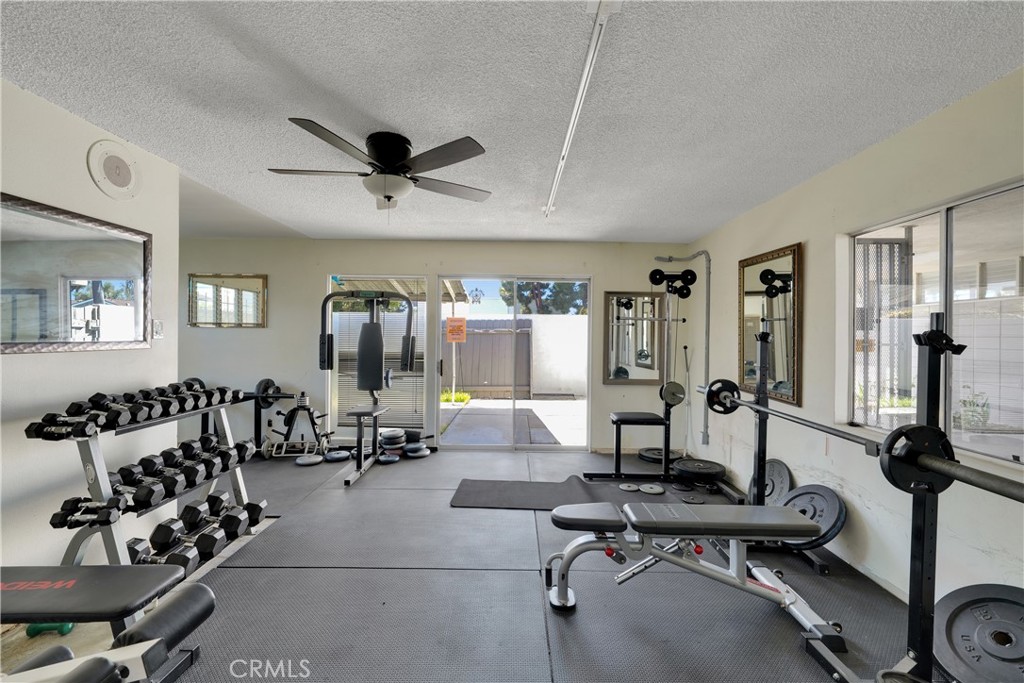 2422 Miseno Way Costa Mesa, CA 92627 - Photo 36 of 40 a view of a livingroom with workspace and a window