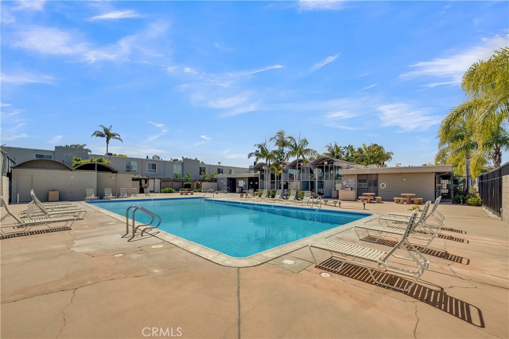 2422 Miseno Way Costa Mesa, CA 92627 - Photo 39 of 40 a view of a backyard with plants and palm trees
