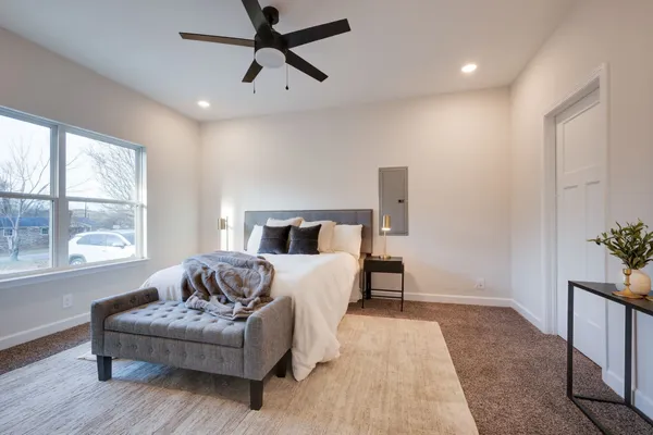 a living room with furniture and a window