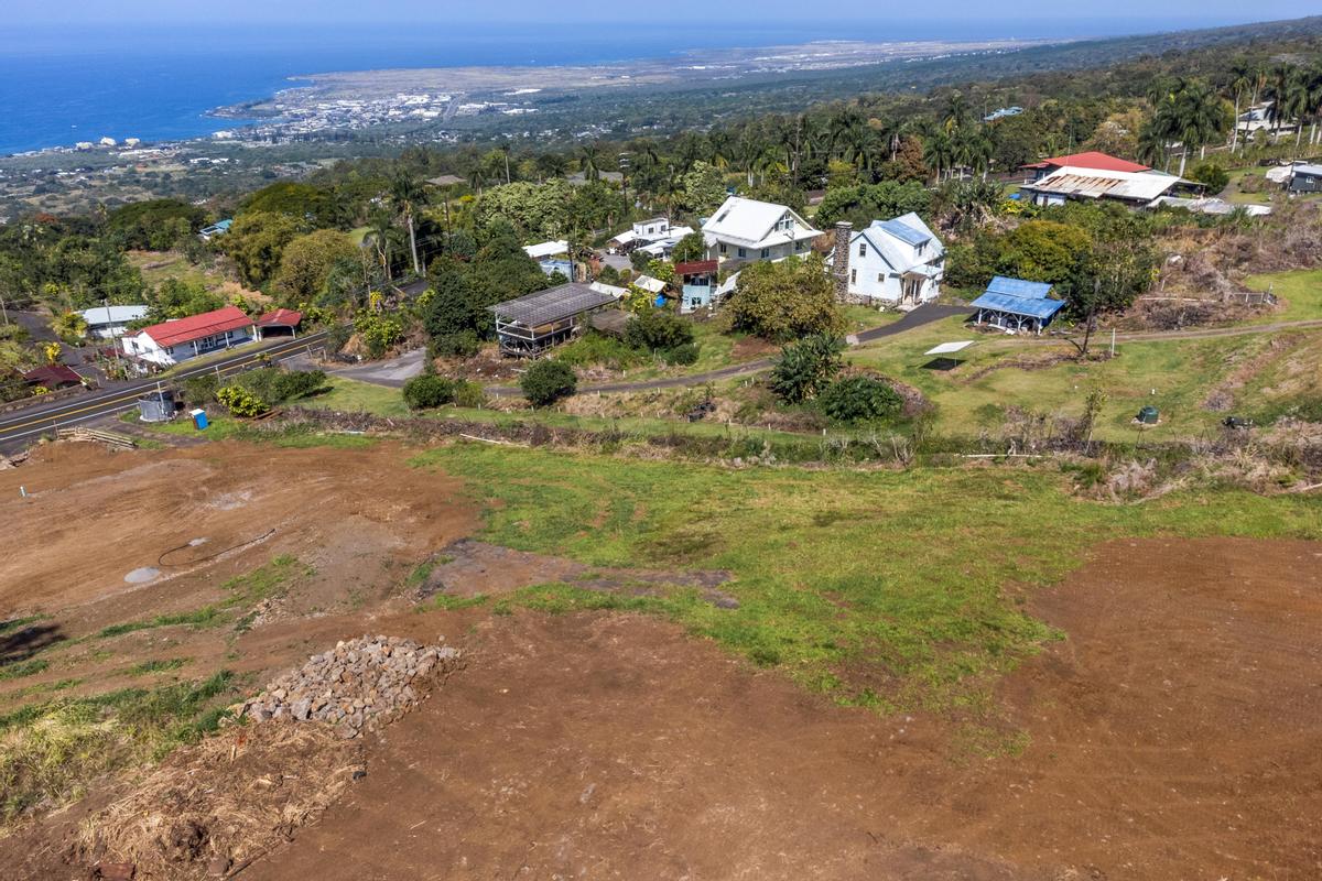 76-1015 Lot 2-a-2 Waiono Ranch Road Holualoa, HI 96725 - Photo 6 of 28 a view of a town with mountains in the background