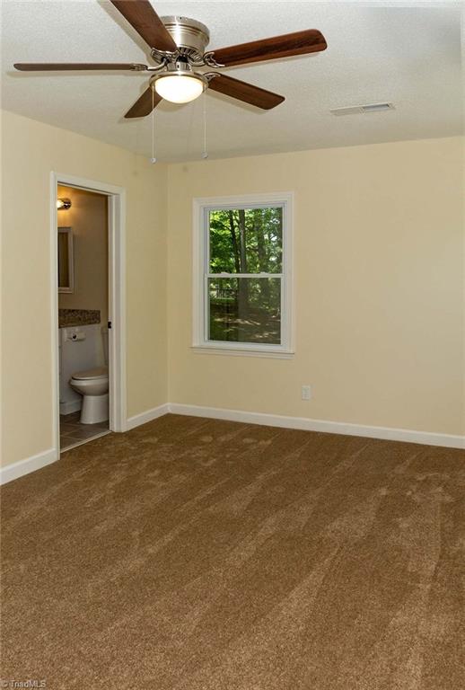 2824 Montclair Road Winston-Salem, NC 27106 - Photo 20 of 30 All bedrooms have fresh paint, new carpet, and new lighting!