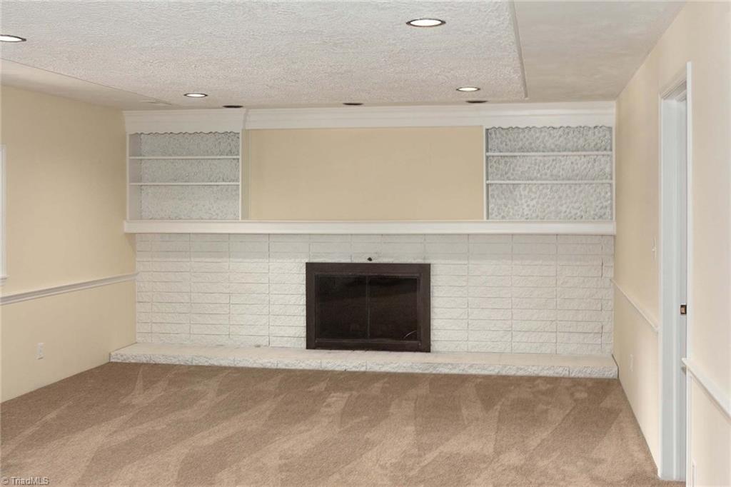 2824 Montclair Road Winston-Salem, NC 27106 - Photo 23 of 30 Lower level den with fireplace!