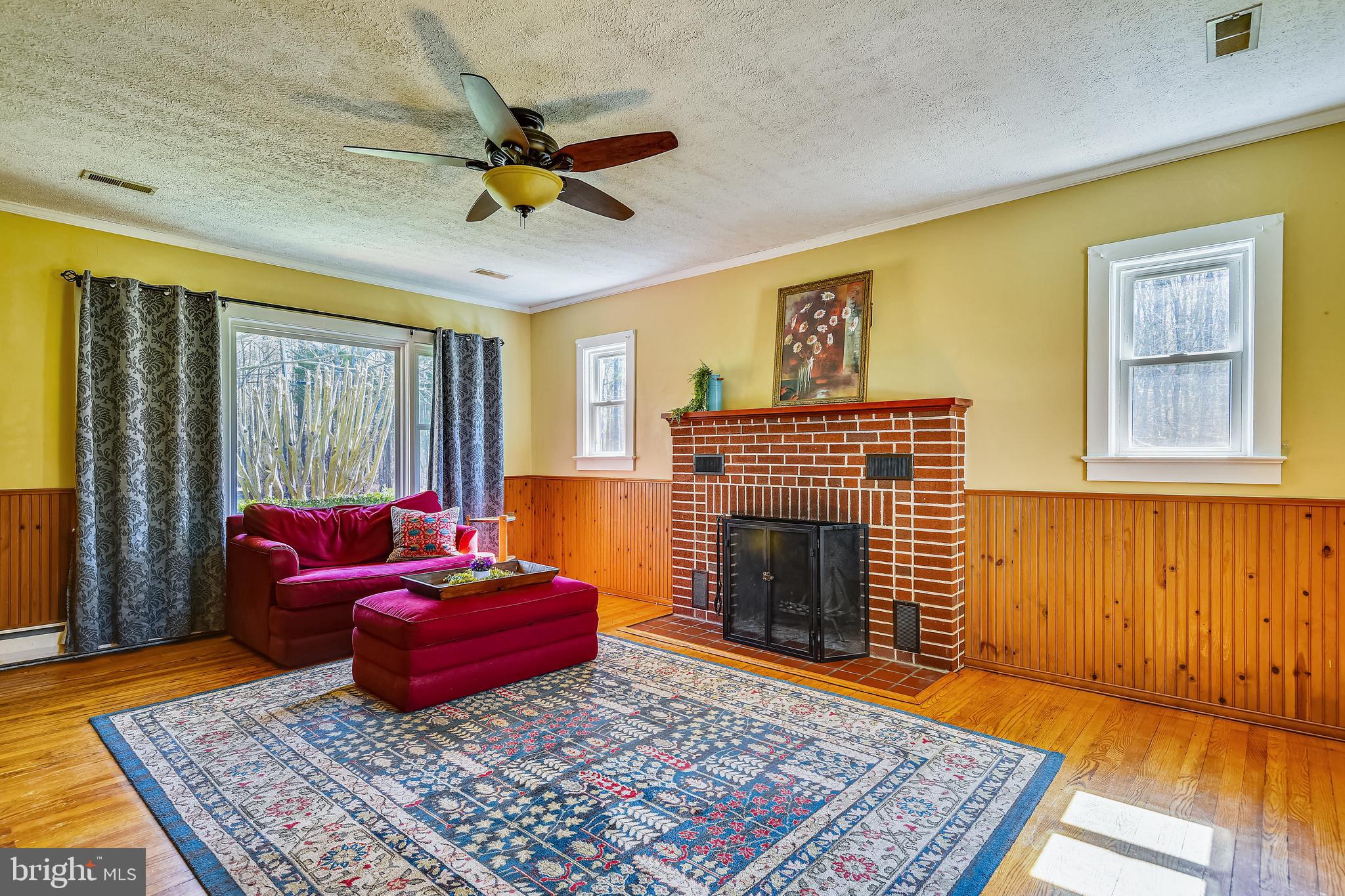 845 Broadwater Road Churchton, MD 20733 - Photo 6 of 48 Cozy Fireplace and Custom Window Casements