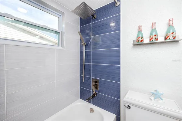 a bathroom with a toilet and a sink