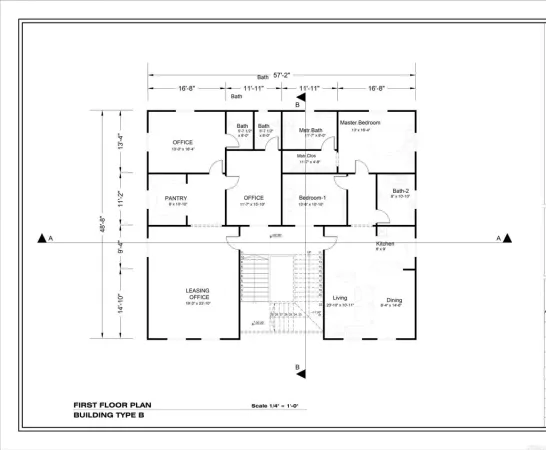 an aerial view of a house with a yard and lake view