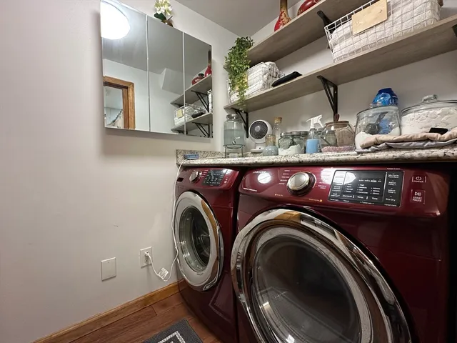 a utility room with dryer and washer
