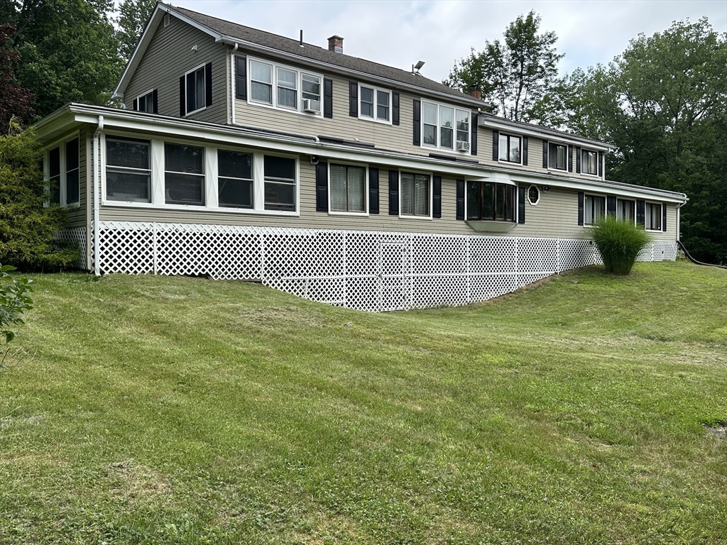 170 Timberidge Drive Russell, MA 01071 - Photo 3 of 31 a view of a house with a yard