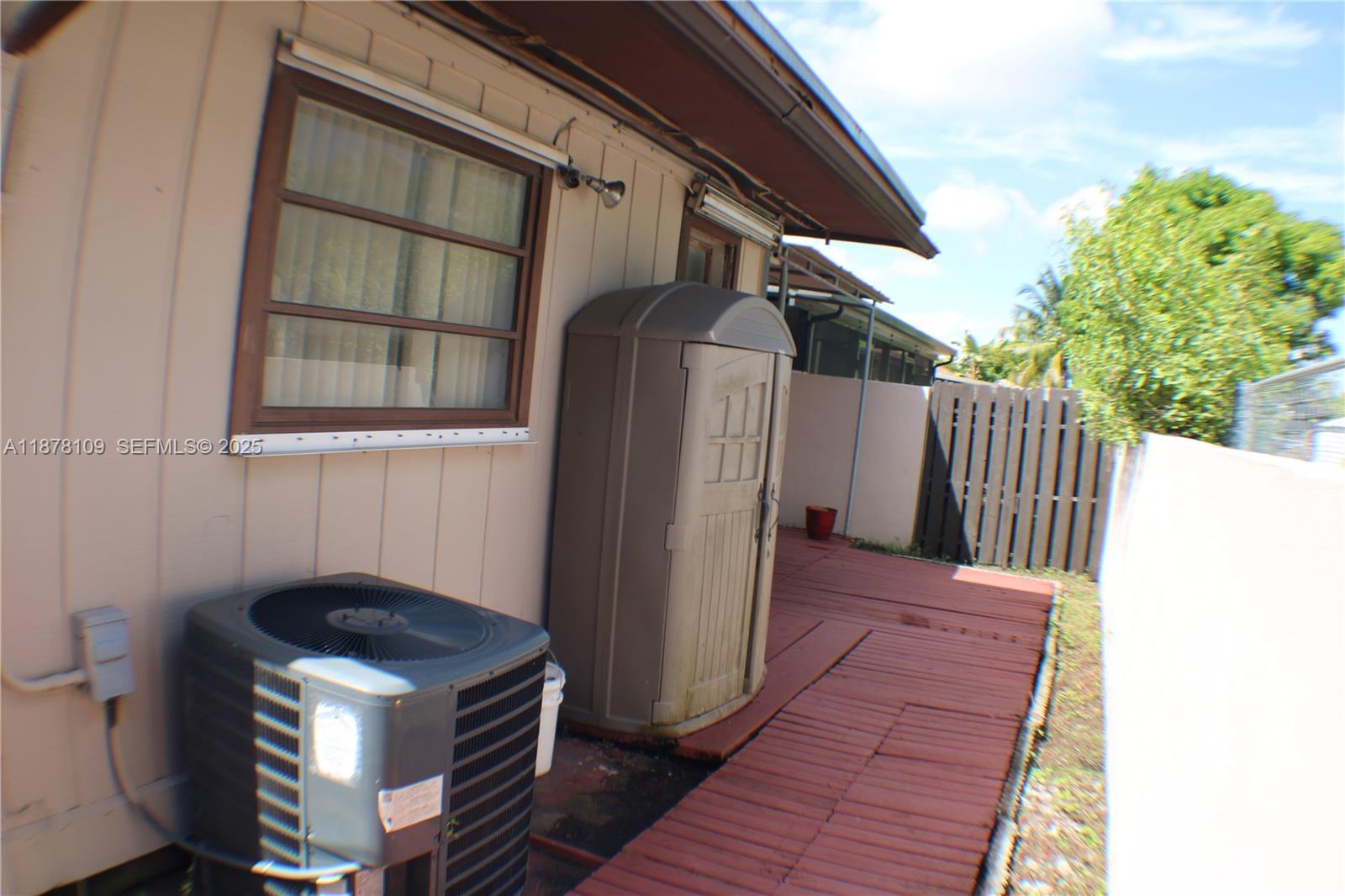 12003 Southwest 110th St Circle North Miami, FL 33186 - Photo 10 of 12 a view of outdoor space and deck