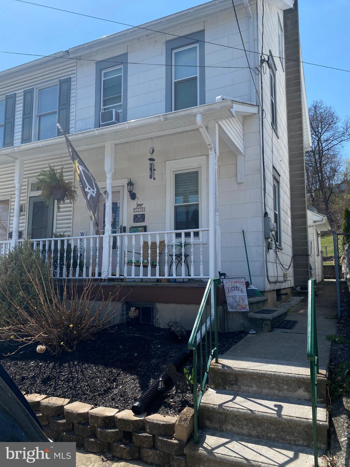 Charming home with inviting porch.
