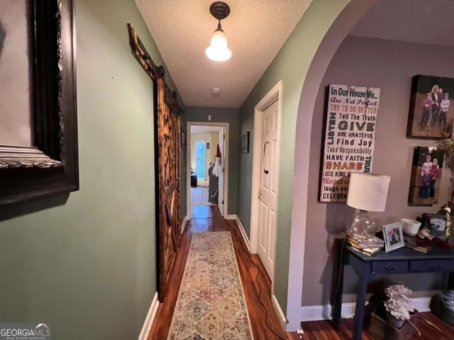 a bed room with a bed and a bookshelf