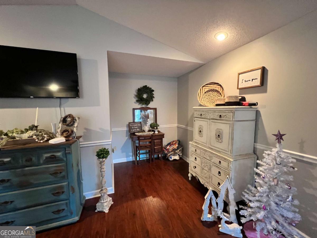 2003 Chevy Place Vidalia, GA 30474 - Photo 19 of 26 a living room with furniture and a flat screen tv