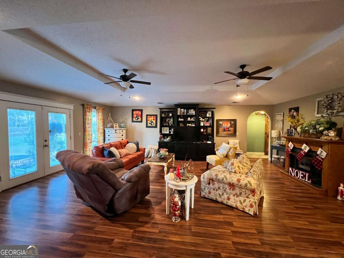 2003 Chevy Place Vidalia, GA 30474 - Photo 6 of 26 a living room with furniture and wooden floor