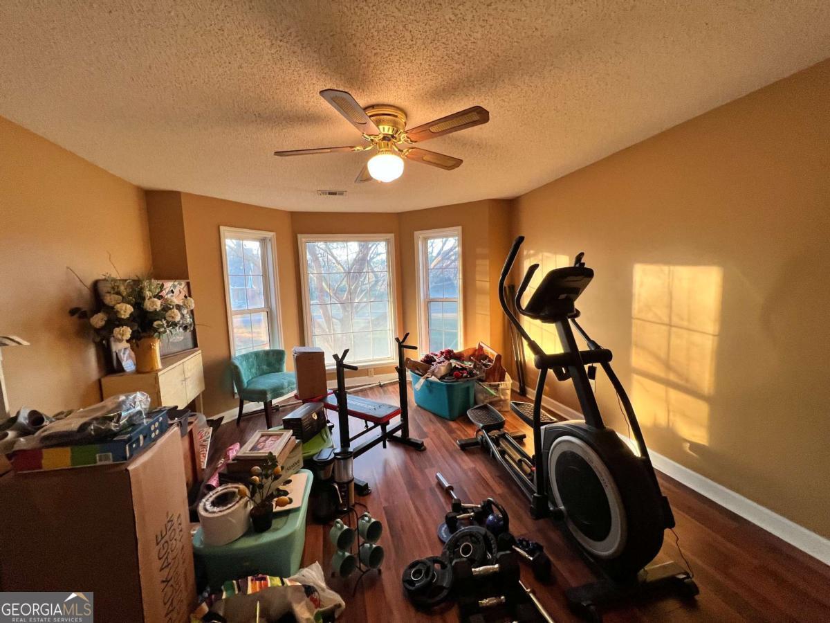 2003 Chevy Place Vidalia, GA 30474 - Photo 7 of 26 a view of a room with gym equipment